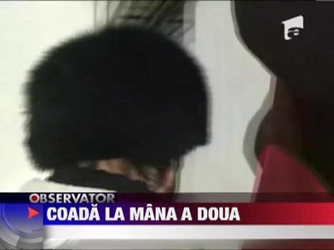 Imbulzeala in fata unui magazin cu produse la mana a doua