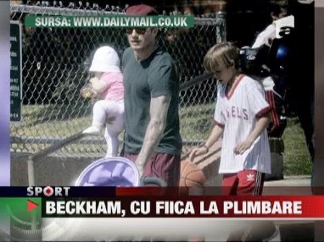 David Beckham, cu fiica la plimbare