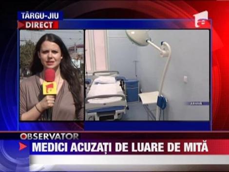 Medic ginecolog cercetat pentru luare de mita