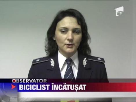 Cu bicicleta in masina politiei