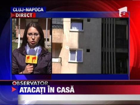 Atac armat in casa unei famili din Cluj