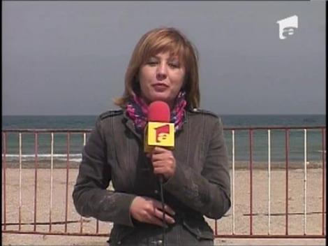 Lumina sfanta la malul marii