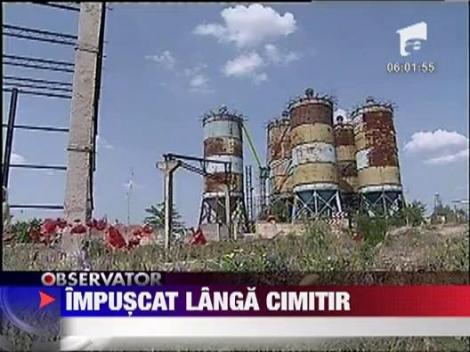 Focuri de arma langa cimitir