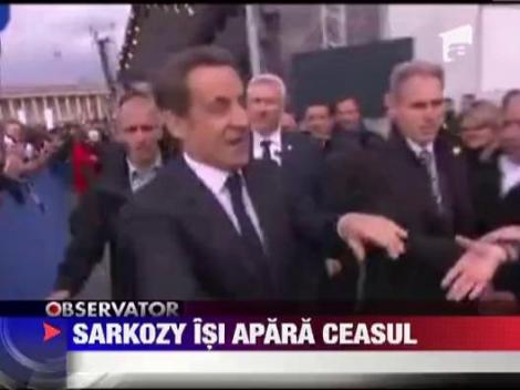 De frica hotilor, Sarkozy isi asunde ceasul cand da mana cu alegatorii