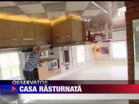 Casa construita si amenajata cu susul in jos