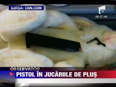Pistol in jucariile de plus