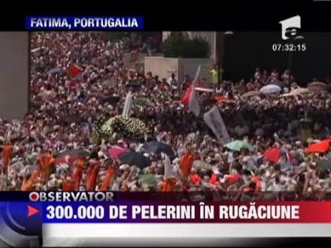 Portugalia: 300.000 de pelerini s-au rugat la Fatima