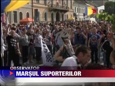 Mii de sustinatori ai Universitatii Cluj au protestat pe strazile orasului