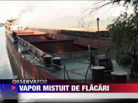 Flacari pe Dunare: Un impingator sub pavilion bulgaresc a luat foc pe Bratul Bala