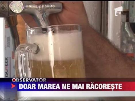 Multi romani se refugiaza de caldura la mare