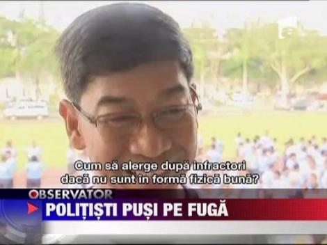 Politistii din Filipine risca sa ramana fara slujba daca nu slabesc
