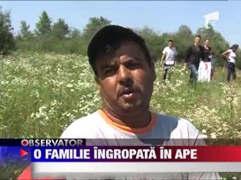 Familie ingropata in apele Siretului