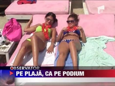 Pe plaja, ca pe podium