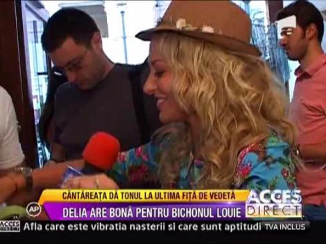 Nimic la voia intamplarii! Delia Matache are bona pentru bichonul Louie!