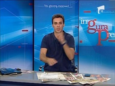 Mircea Badea: Traian Basescu tinand un copil in brate mi se pare "vomitiv"