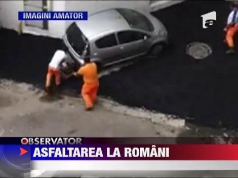 Cum se asfalteaza in Romania: In bataie de joc, pe langa masinile parcate