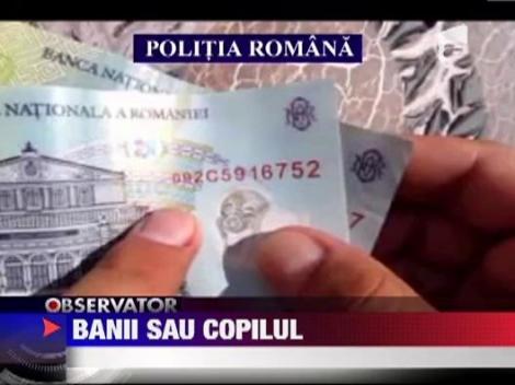 I-a cerut 1400 de lei ca sa sa nu-i rapeasca copilul!