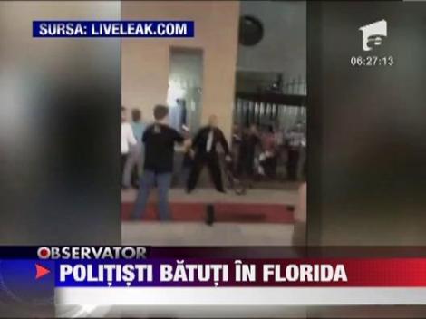 IMAGINI SOCANTE! Lupta pe viata si pe moarte intre doi politisti si noua adversari, in Florida