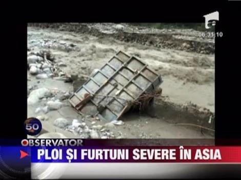 Furtunile si inundatiile fac ravagii in Asia: 32 de morti si cinci disparuti