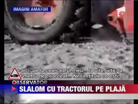 Un sofer de tractor s-a gandit sa aranjeze nisipul, chiar printre cearceafurile oamenilor