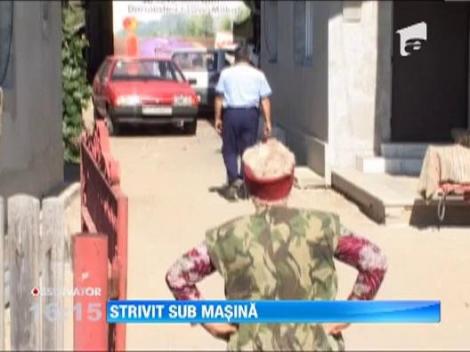 Mecanic auto strivit sub masina