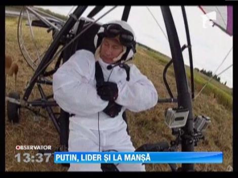 Vladimir Putin a condus un stol de cocori cu ajutorul unui deltaplan