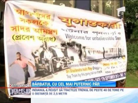 India: Un barbat a tras cu ajutorul parului un tren de 40 de tone!