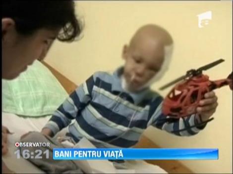 Andrei, baietelul operat de tumoarea gigant,  va mai suferi cateva interventii chirurgicale
