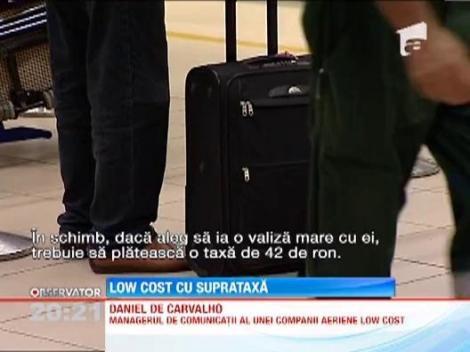 Taxa pentru bagajele de mana in avion, in Romania
