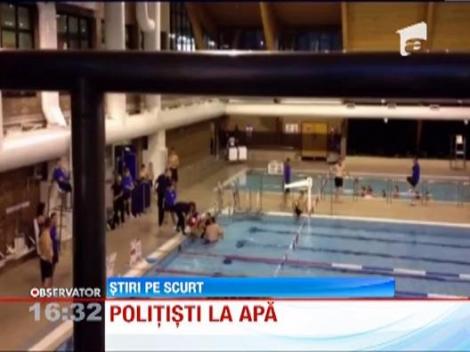 Barbat scos cu forta din dintr-o piscina publica de opt politisti