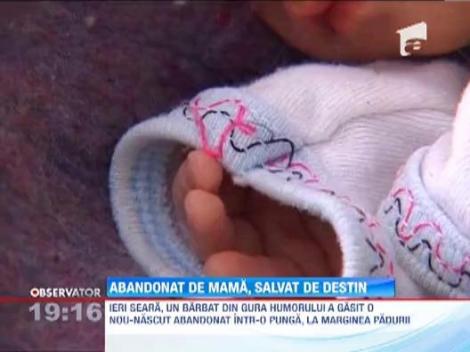 SOCANT! Bebelus abandonat intr-o punga de plastic, pe marginea unui parau