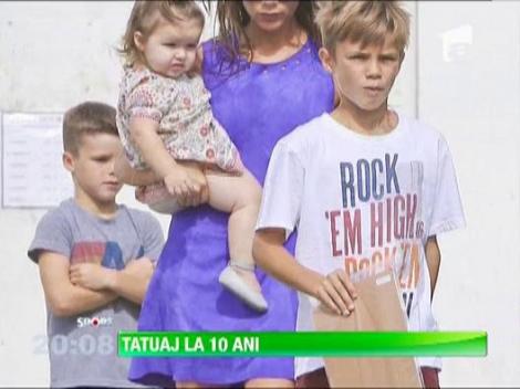 Romeo Beckham, copia fidela a tatalui sau. Fiul fotbalistului si-a "tatuat" numele surorii lui pe gat