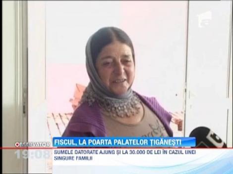 Datori la fisc: Rromii din Targu Jiu isi vand palatele