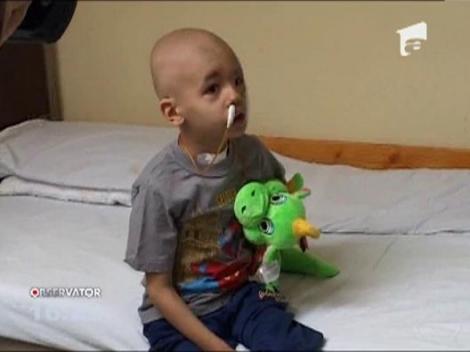 Copilul operat de tumoarea gigant de pe fata a fost externat