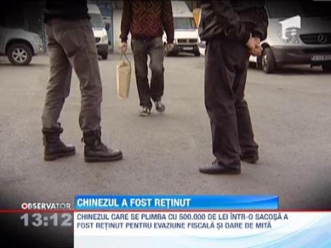 Chinezul prins cu o sacosa plina cu bani, retinut pentru evaziune fiscala