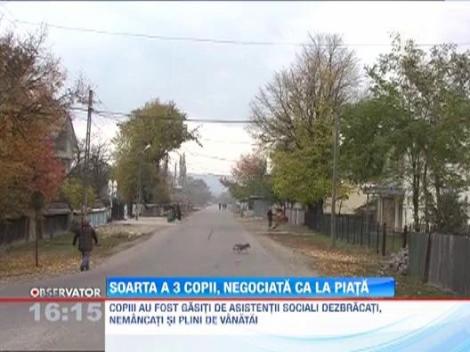 Soarta a trei copii, negociata ca la piata