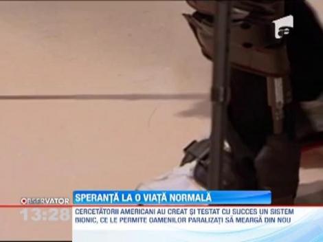 Primul costum bionic ce le permite oamenilor paralizati sa mearga din nou