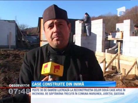 Case construite de voluntarii din Marginea