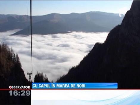 Fenomen spectaculos pe platoul Bucegi! "Marea de nori" a inghitit muntii