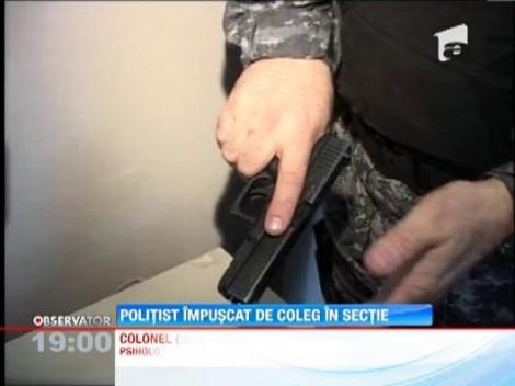 UPDATE / Politist impuscat din greseala de un coleg