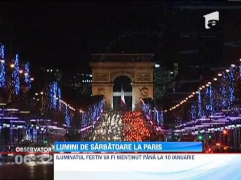 Diane Kruger si primarul Parisului au aprins luminile de Craciun pe Champs Elysees