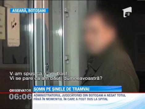 Bautura, bat-o vina! Un angajat al Judecatoriei Botosani a adormit pe sinele de tramvai
