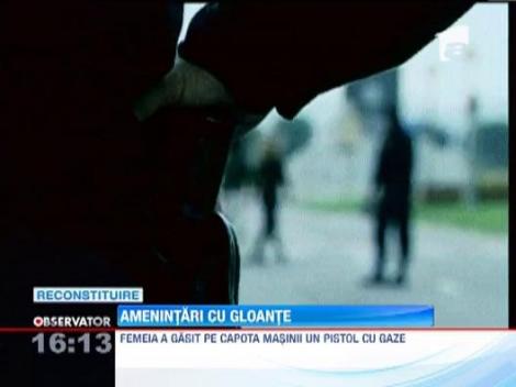 Un om de afaceri din Resita si-a gasit masina gaurita de gloante si un pistol pe capota