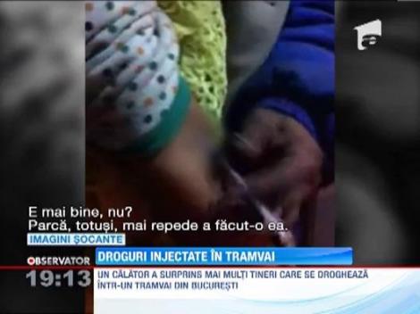 Strigator la cer! Drogatii din Bucuresti trag in vene in tramvai!