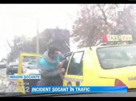 VIDEO! Un taximetrist a fost luat la bataie in trafic, de soferul unui microbuz