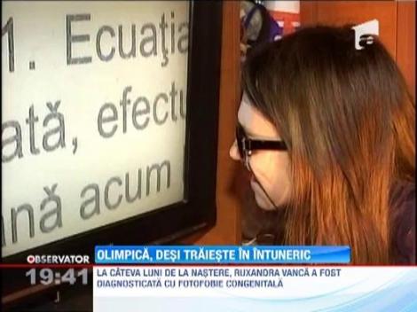 Impresionant! Este olimpica la matematica, romana si franceza, desi traieste in intuneric! 