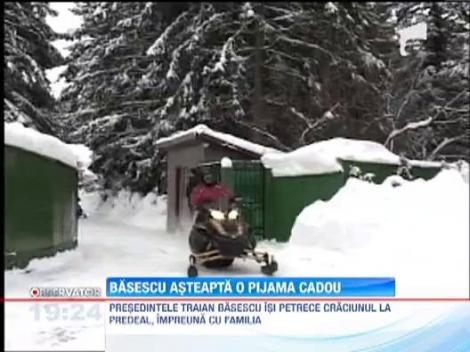 Traian Basescu, declaratii de pe snowmobil: 2013 va fi un an riscant