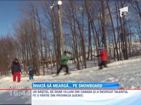 Pe snowboard la numai un an si jumatate! Cu SUZETA in gura!