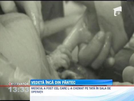 Un bebelus a prins cu mana degetul medicului in timpul operatiei de cezariana