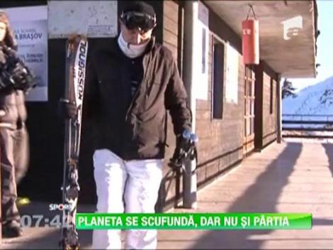 Planeta se scufunda, dar nu si partia! Copos schiaza de zor in Poiana Brasov